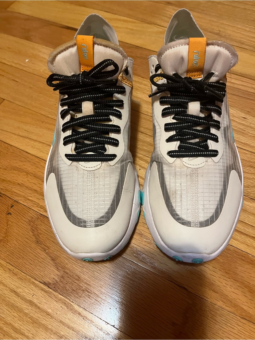 Nike Renew Lucent Cream/White Upper with Black Laces and Orange Tongue
